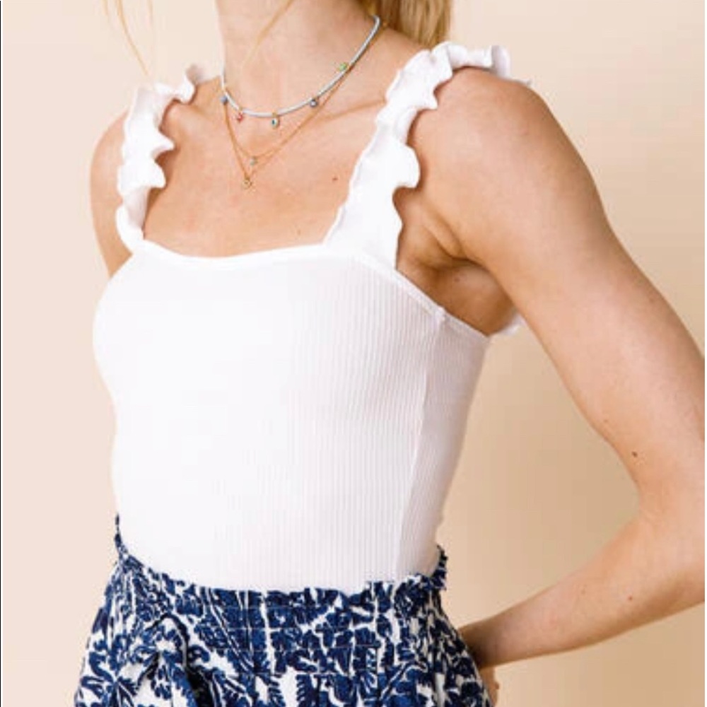 Charlotte Avery white ruffled tank top sleeve bodysuit